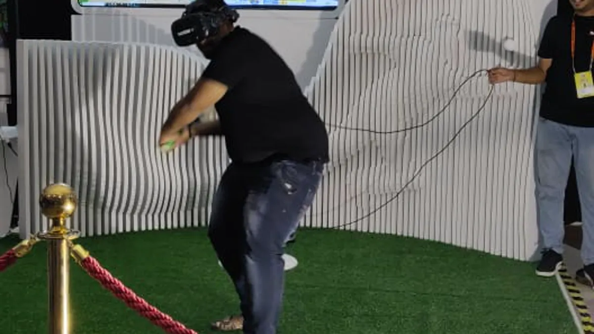 Fan playing HotstarVR cricket activation